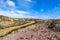 The colourful remains of the former copper mine Parys Mountain near Amlwch on the Isle of Anglesey, Wales, UK