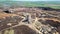 The colourful remains of the former copper mine Parys Mountain near Amlwch on the Isle of Anglesey, Wales, UK