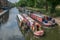 Colourful river boat barges on a London Canal