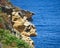 Colourful rock formations on the Cantabrian coastline. Mount Jaizkibel, Basque Country, Spain