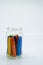Colourful school supplies, stationery on white background - space for caption