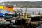 Colourful sheds and boat docks along a rocky beach on the East Coast of Canada at Heart\\\'s Content Newfoundland