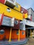 Colourful ship containers transformed into artist studios in Trinity Buoy Wharf London England