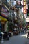 Colourful shops along narrow street Hanoi Vietnam 