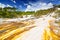 Colourful silica terrace formed by hot water algae growing in the geothermal area of Orakei Korako The Hidden Valley, Northern