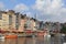 The colourful skyline and sailboats in the harbour of honfleur, france in summer