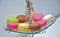 Colourful stacked French Macarons. Colourful typical French pastry. Top view