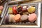 Colourful stacked French Macarons. Colourful typical French pastry. Top view