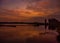 Colourful sunrise with swans and geese at Willen Lake, Milton Keynes