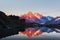 Colourful sunset on Lac Blanc lake in France Alps