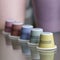 Colourful, sustainable eco friendly coffee capsules. The pods are compostable and biodegradable.