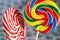 Colourful sweets candy rainbow and peppermint swirl lollipop close up macro photography