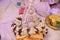 Colourful traditional view of bengali wedding rituals with tharmocol made cap surrounded by garland in india