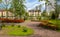 Colourful Tulips Flowerbeds and Path in an Spring Formal Garden