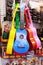 Colourful Ukuleles in an outdoor tourist market