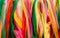 Colourful vibrant nylon ribbons abtract background
