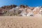 Colourful volcanic rock formations in Paliochori beach of Milos, Greece