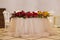 Colourful wedding decorations. Wedding main table with fresh flowers. Sunflower wedding decor. Wedding day.