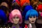 Colourful wigs on a mannequins head