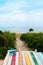 Colourful wooden beach decking at tropical summer island