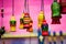 Colourful wooden bells hanging by string. Musical instrument