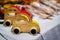 Colourful wooden car vintage toy to be dragged by thread.