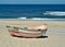 Colourful wooden fishing boats on Portugals west coast beach