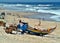 Colourful wooden fishing boats on Portugals west coast beach