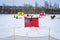 Colourfull Ice Fishing cabins in a vast spaces on the frozen river