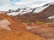 colourfull rhyoliet KerlingarfjÃ¶ll volcanic mountains in geothermal area in iceland with snow tangues