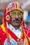 A colourfully dressed man poses for a phototgraph in a Cusco street during the May Day parade in Peru.
