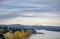 Columbia River autumn landscape with boat and yacht pier and snowy Mount Hood