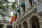 The Columbian and Cartagena flags on a colonial style building in old town Cartagena, Colombia