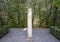 Column of Al-Mutamid in the gardens of the Real Alcazar in Seville, Andalusia, Spain.