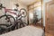 A column with dirt bikes inside a bedroom