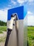 The column of the electric charging station in the field
