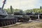 A column of modern military tanks