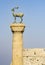 A column with a stag statue on the island of Rhodes, Greece.