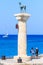 Column with a statue of a deer. Port of Mandraki. Rhodes Island. Greece