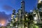 Column tower petrochemical plant stand with chimney background a