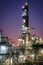 Column tower in petrochemical plant at twilight