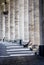 Columned hallway in Saint Peter\'s Square. Vertical shot.