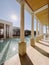 Columned terraces by the long pool of the Amanzoe Hotel. Peloponnese, Greece