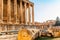 Columns of ancient Roman temple of Bacchus with surrounding ruins of ancient city, Bekaa Valley, Baalbek, Lebanon