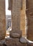 Columns with ancient stone carved egyptian hieroglyphics