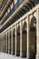 Columns with arches in the facade of a medieval building