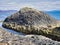 Columns of jointed volcanic basalt rocks on the island of Staffa in the Inner Hebrides, Scotland