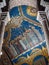 Columns and mosaic ceiling with sacred images inside the sacre-coeur church in the Montmartre district, Paris.