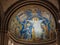 Columns and mosaic ceiling with sacred images inside the sacre-coeur church in the Montmartre district, Paris.