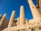 Columns of Propylaea gate entrance of Acropolis, Athens, Greece against blue sky